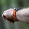 Sportowy pasek silikonowy Suunto 24 mm w kolorze granitowo-pomarańczowym, rozmiar S+M Sportowy pasek silikonowy Suunto 24 mm w kolorze granitowo-pomarańczowym, rozmiar S+M
